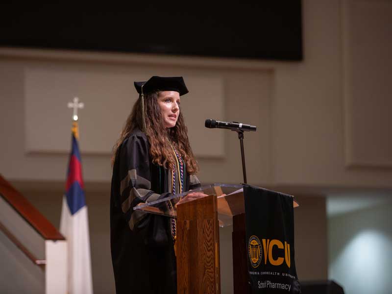 Pharm.D. Class of 2025 student speaker Katie Visconti shares her journey to get to graduation as the mother of five young children with the audience at the VCU School of Pharmacy Hooding and Diploma Ceremony on May 9, 2025, at St. Paul’s Baptist Church North.